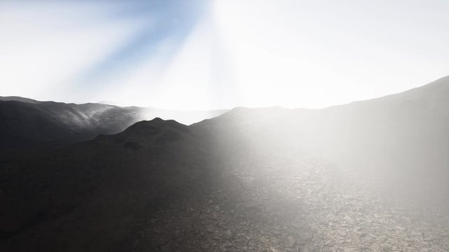 mountain landscape in high altitude with rays of light