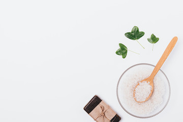 Flat lay with bowl of natural sea salt