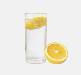 Fototapeta na wymiar Lemon falling on soda in glass