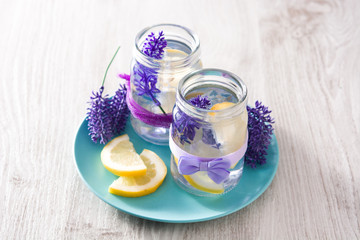 Obraz na płótnie Canvas Lavender lemonade drink in jar on wooden table