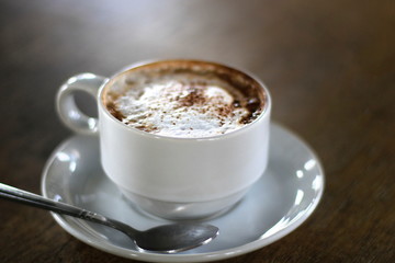 Hot mocha coffee in the morning in a white glass