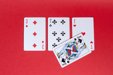 The combination of poker cards. three , seven, ace
