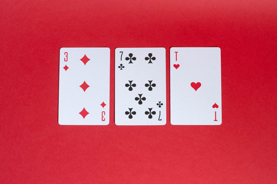 The combination of poker cards. three , seven, ace