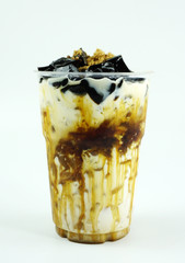 Fresh milk caramel take home cup beverage for summer isolated on white background.