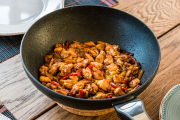 Manchurian Chicken with Soy Sauce, Julienne  Vegetables in Iron Wok Pan / Asian Style Cooking