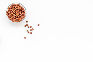cereals, oatflakes and cornflakes for healthy breakfast on white background top view mock up