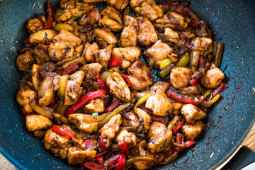 Manchurian Chicken with Soy Sauce, Julienne  Vegetables in Iron Wok Pan / Asian Style Cooking