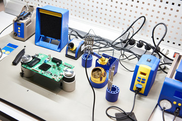 Workplace with soldering iron and tool for electronic