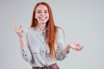 picture of young redhead be lost in thought businesswoman in striped shirt with pack of condom and...