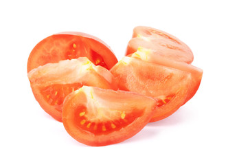 Fresh tomatoes cut into slices on a white background
