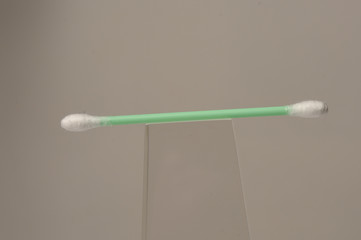 Close-up of cotton swabs on white background