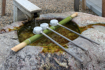 ladles for ablution in a shinto shrine in izumo (japan) 