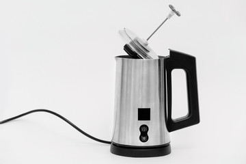 The milk foam maker is automatic.  The frother is made of stainless steel with a black plastic top,...