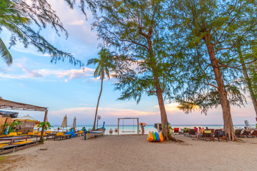 Beautiful sunset on white sand beach and Clear water to see the coral reef at Koh Lipe island in Satun,Thailand