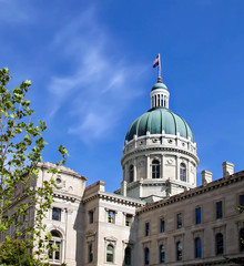 Indianapolis state capitol building on a clear bright blue sky day.