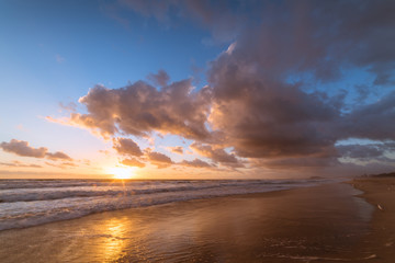 Fototapeta na wymiar Tropical beach sunrise landscape with beautiful sky