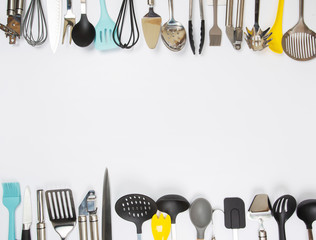 different kitchenware on a gray background top view. Cooking appliances.