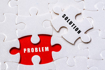 White jigsaw puzzle with conceptual question and answer 