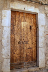 This old oak door is very sturdy and a great entrance to the house.