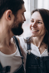 happy couple near the window