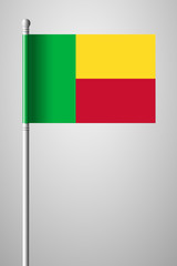 Flag of Benin. National Flag on Flagpole. Isolated Illustration on Gray