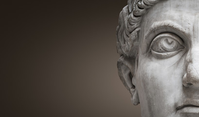 Statue of Roman Nobel Man, his face at closeup, isolated at smooth gradient background, Rome