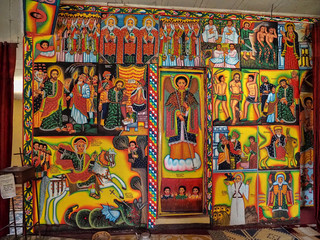 Religious frescoes on the wall of Tana Hayk Eysus United Monastery on Lake Tana in Ethiopia