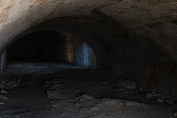 Stone cave in the ground.