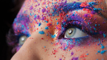 Explosion of color, bright creative makeup, colorful eyeshadow.