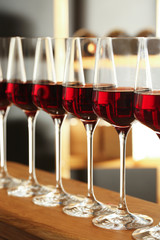 Glasses of red wine in cellar. Expensive drink