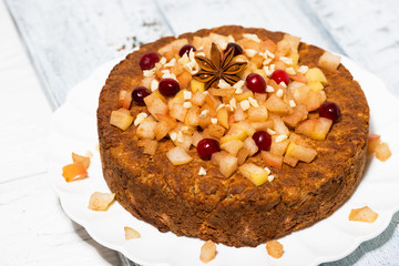 flavored apple pie with spices, top view