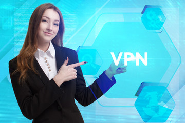 The concept of business, technology, the Internet and the network. A young entrepreneur working on a virtual screen of the future and sees the inscription: VPN