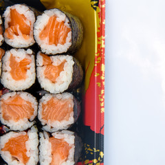 Sushi Roll with salmon on the white background .Food abstract background