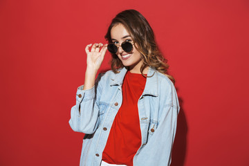 Portrait of a cheerful stylish young woman