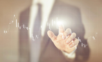 Fototapeta na wymiar candlestick chart, businessman working with stock market analytics