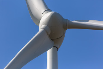 Detailed close up view of a wind turbines; generator, rotor and blade view