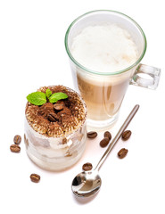 Classic tiramisu dessert in a glass and cup of coffee isolated on a white background with clipping path
