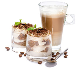 Classic tiramisu dessert in a glass and cup of coffee isolated on a white