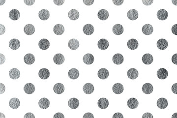 Silver painted polka dot background.
