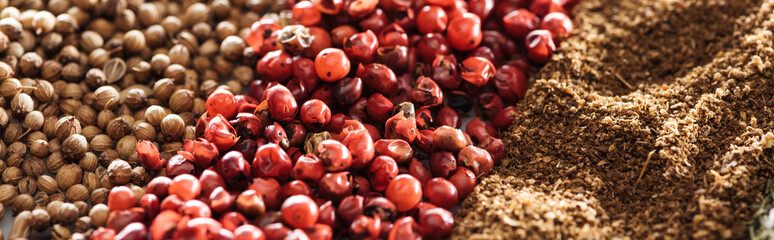 close up view of traditional indian spices and dried berries, panoramic shot
