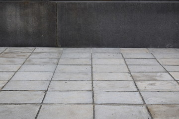  Black wall on gray floor