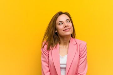 Young fashion business woman dreaming of achieving goals and purposes