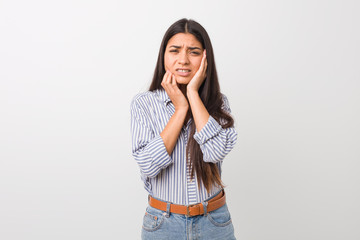 Young pretty arab woman whining and crying disconsolately.