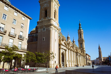 Fototapeta na wymiar Zaragoza, Aragon, Spain 2019 : Baroque facade of the Basilica of Our Lady of the Pillar at Plaza del Pilar square. It is reputed to be the first church dedicated to Mary in history.