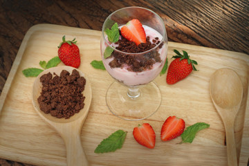 Beautiful food set of layer of milk Yogurt with topping by strawberry and brown cracker