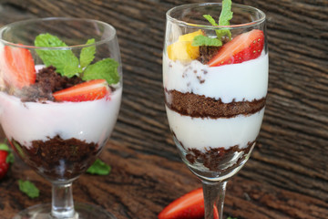 Beautiful food set of layer of milk Yogurt with topping by strawberry and brown cracker