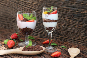 Beautiful food set of layer of milk Yogurt with topping by strawberry and brown cracker