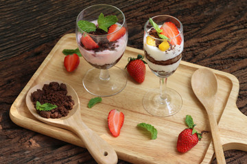 Beautiful food set of layer of milk Yogurt with topping by strawberry and brown cracker