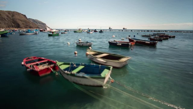 Timelapse of Small Fishing Boats Connected to Pier of Sand Andres Beach Tenerife Canary Islands Spain