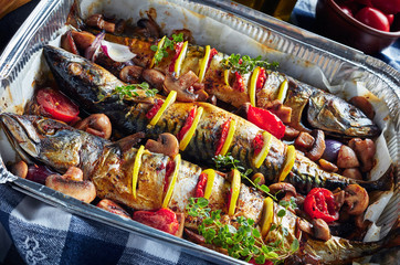 close-up of hot three whole broiled mackerels